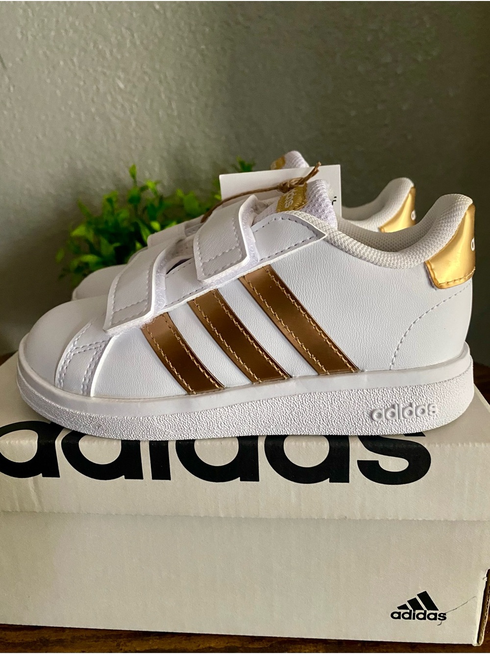 adidas Kids White Sneakers with Gold Stripes